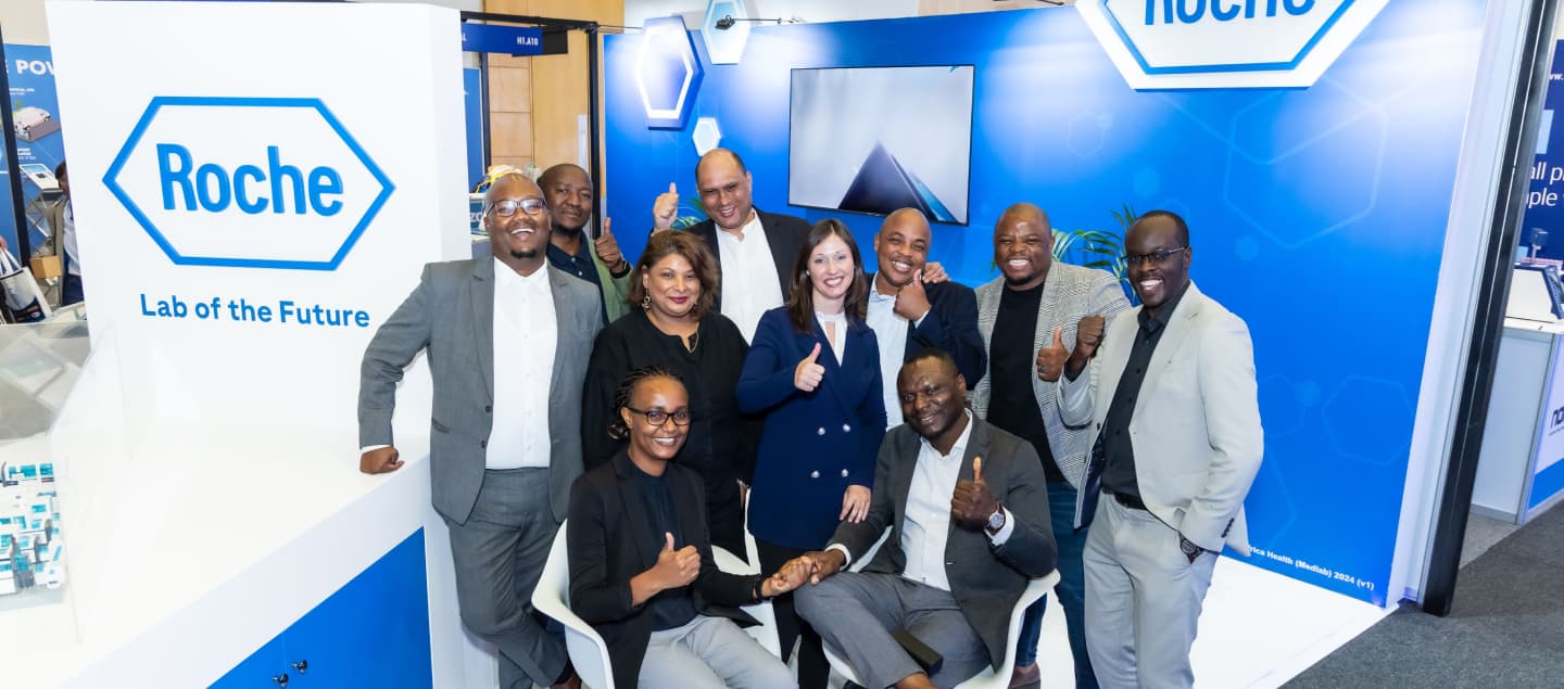 Exhibitors from Roche at their stand at World Health Expo Cape Town.