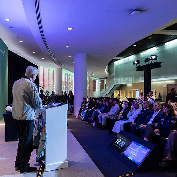 Male Speaker on stage at a WHX Dubai CME Conference