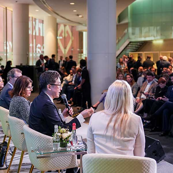 Global experts speaking on stage at a WHX Dubai Conference