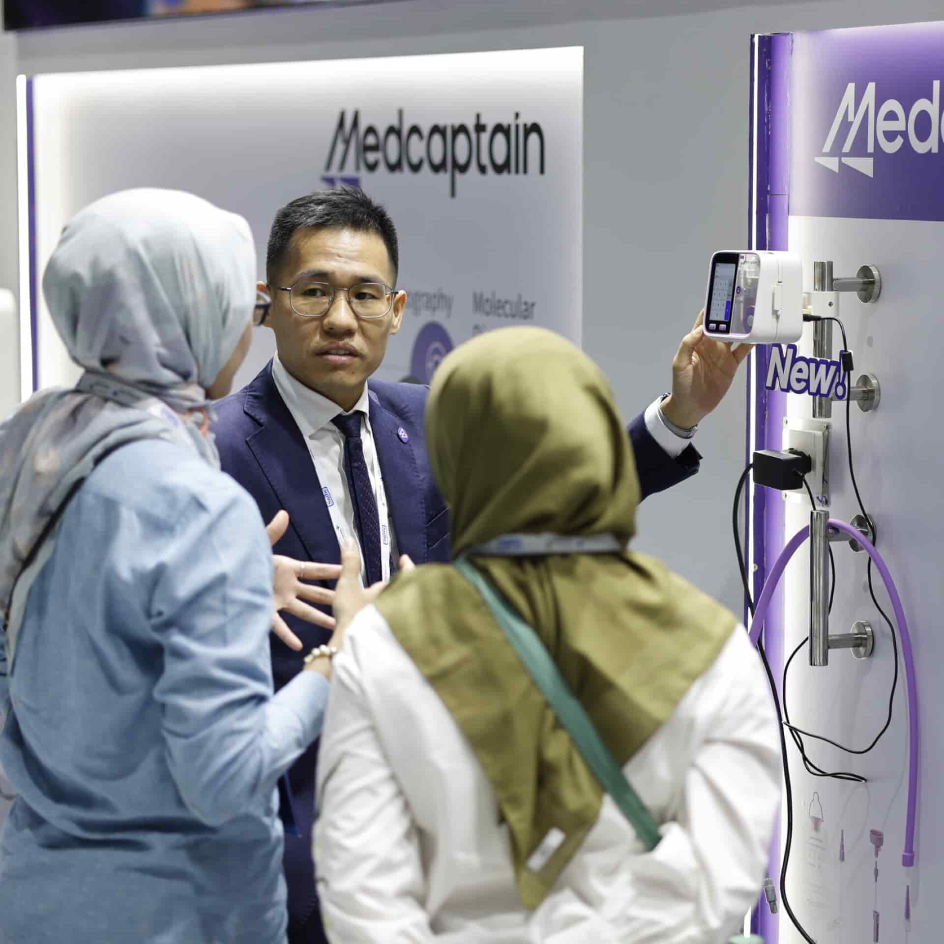 Exhibitor demonstrating his product at World Health Expo Kuala Lumpur