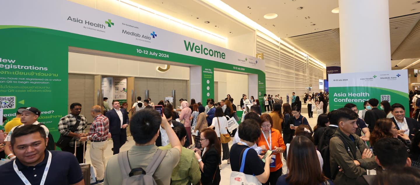 The entrance of World Health Expo Kuala Lumpur busy with people