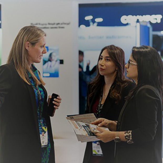 3 females in a discussion at WHX Tech 2025