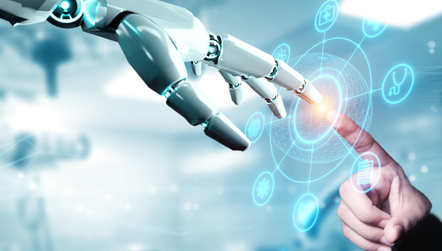 Robot hand touching fingertips with a human hand.