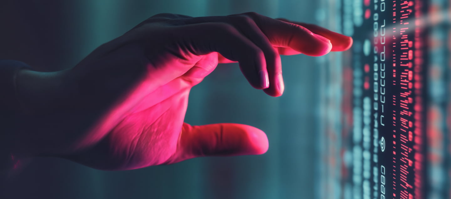 Hand pointing to a digital display