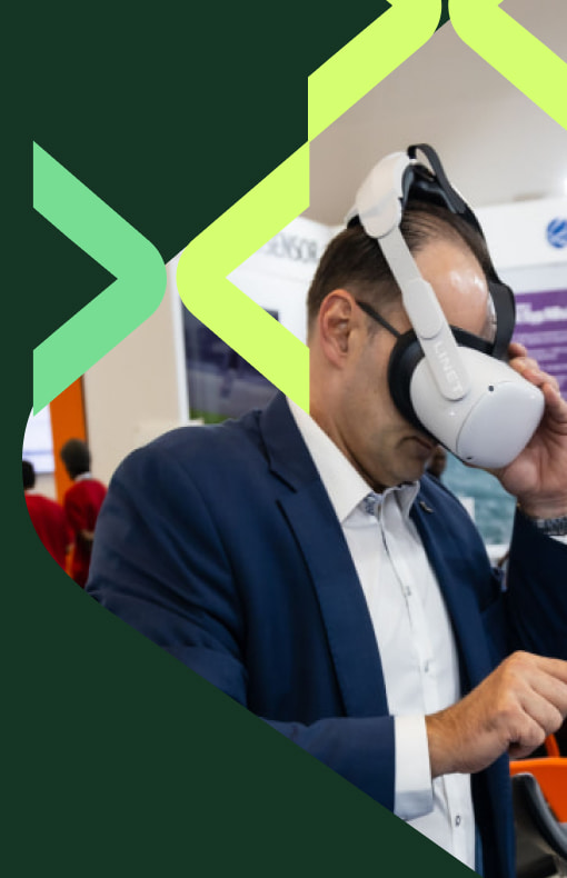 Delegate trying a VR headset at World Health Expo Labs Cape Town.