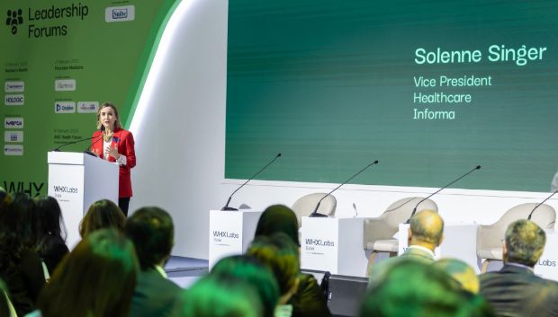 Solenne Singer speaker at podium
