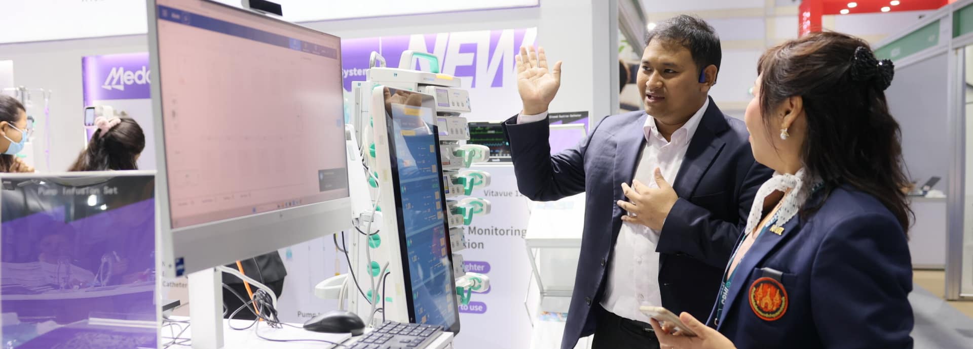 Medical equipment being explained at World Health Expo Labs Kuala Lumpur