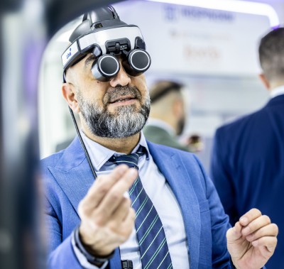 WHX Dubai attendee wearing a binocular loupe