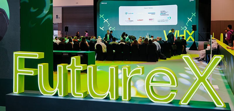 Future X signage on stage