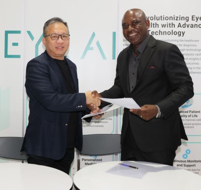 2 men shaking hands at a presentation at WHX Kuala Lumpur