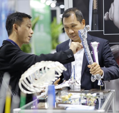 Exhibitor demonstrating a product at WHX Kuala Lumpur
