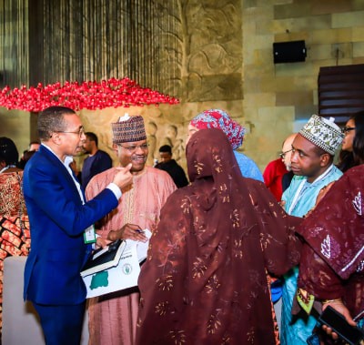 Delegates talking at WHX Lagos