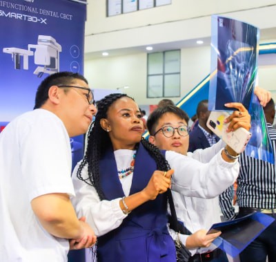 Delegates looking at an x-ray at WHX Lagos