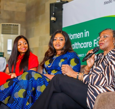 Speakers on stage at a WHX Lagos Conference