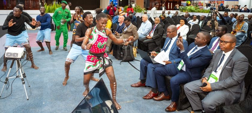 A conference audience with dancers at World Health Expo Nairobi