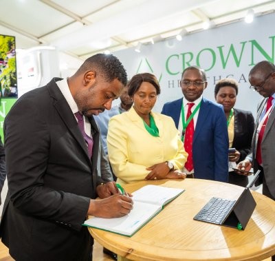 Contract signing with an exhibitor at World Health Expo Nairobi